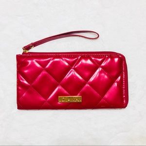 Joy & Iman red patent leather clutch